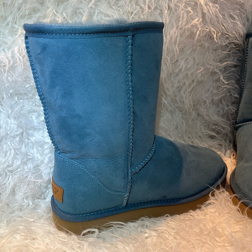 Ugg calf high boots. New without the box. Blue.